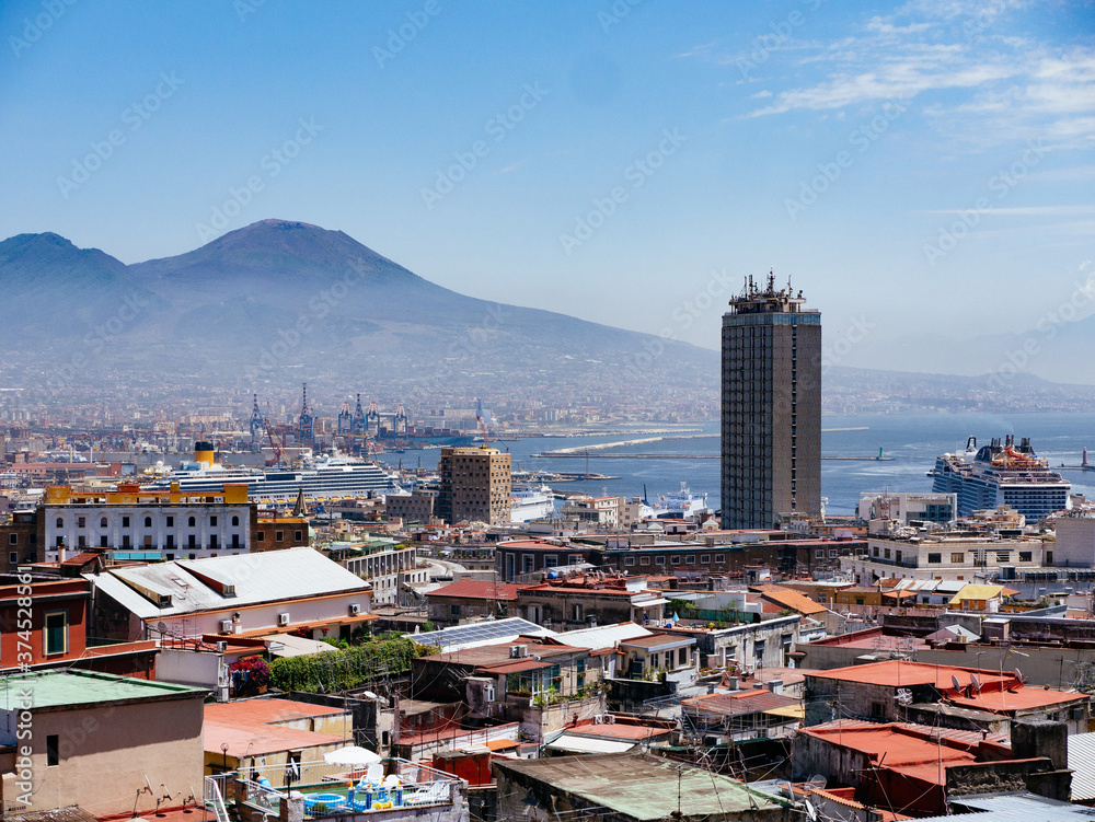 Naples cityscape with view towards Vesuvius and Naples port