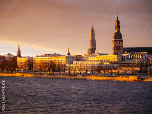 Cityscape with golden sunset and clouds in Riga, Latvia