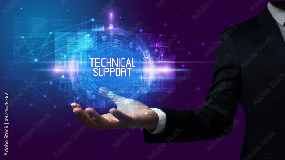 Man hand holding TECHNICAL SUPPORT inscription, technology concept Man hand holding TECHNICAL SUPPORT inscription, technology concept