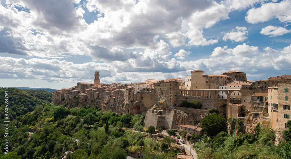 Spectacular view from Pitigliano, a small  medieval town in Tuscany, Italy, in a beautiful cloudy day
