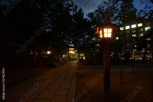 Night scene of small town with street lights in Japan, Matsumoto.