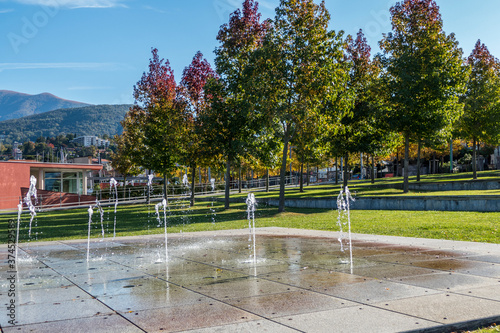 Wallpaper Mural Foliage in Luino in a park with a little fountains Torontodigital.ca