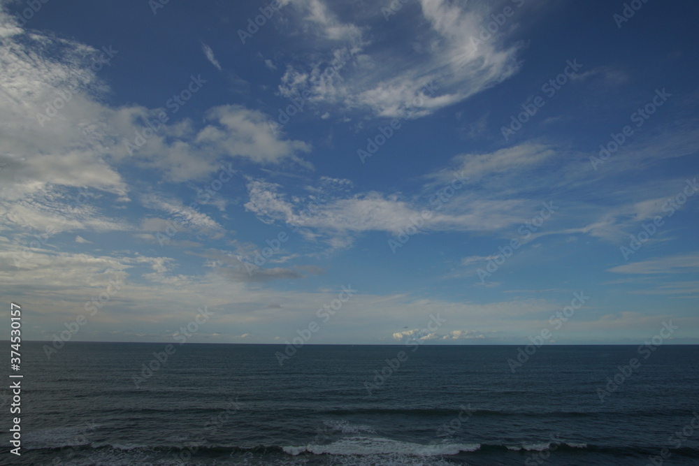 perfect blue sky with clouds and water of the sea perfect blue sky with clouds and water of the sea