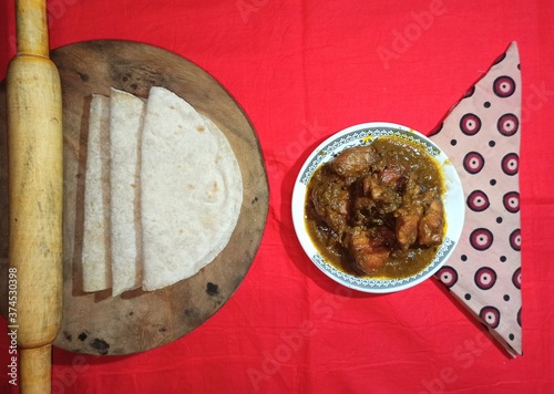 Roti or Ruti with Chicken curry, traditional Bengali lunch photo