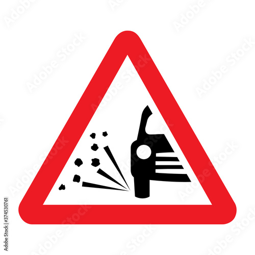 Loose chippings road sign. Vector illustration of red triangular warning traffic sign. Caution gravel road or verge.