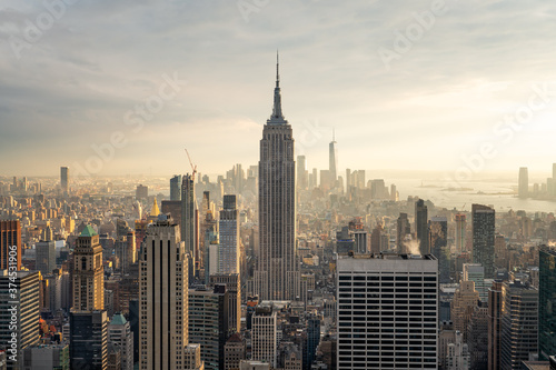 Lower Manhattan skyline with Empire State Building at sunset, New York City, USA
