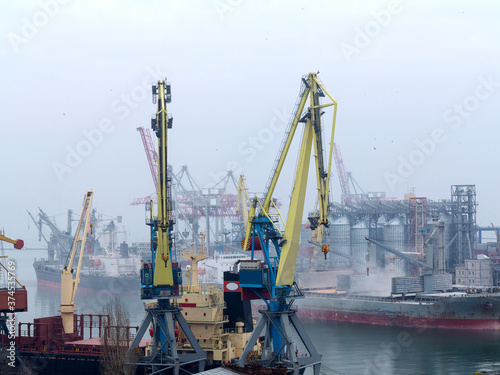 Industrial container freight Trade Port scene in foggy cloudy day