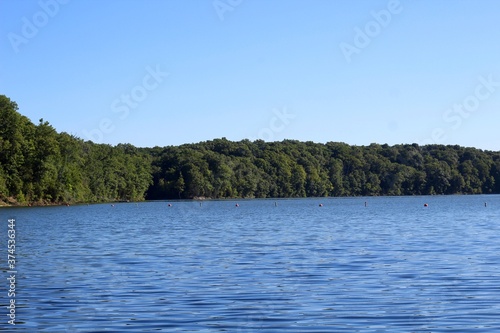 A view of the lake from the lake shore on a clear morning. © Al