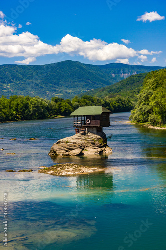 House built on rocks in the middle of the river, Drina River, Serbia 2020.