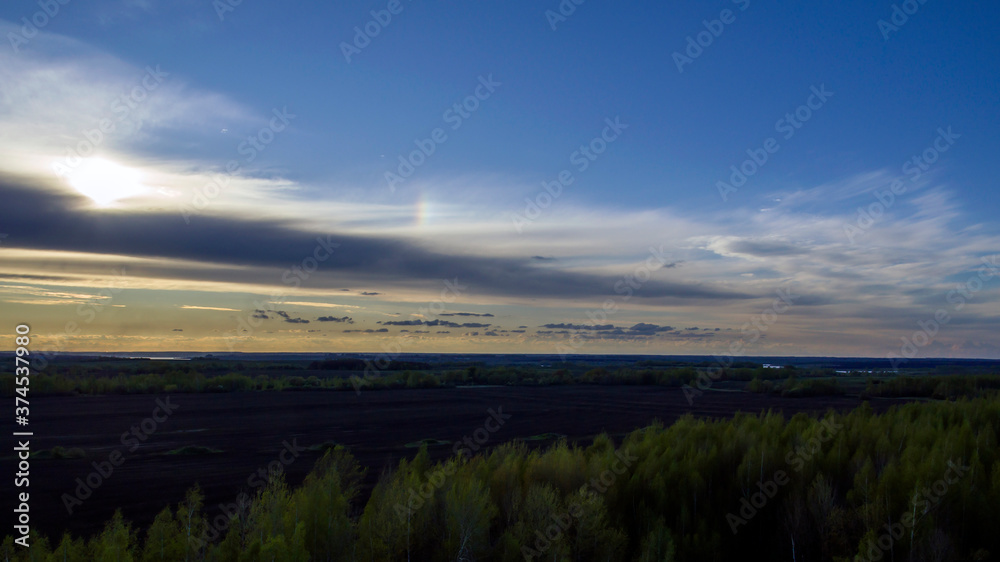 Obraz premium sunset over the river