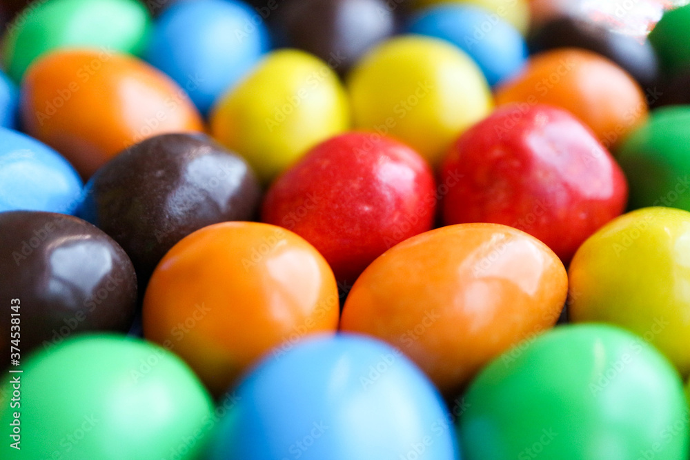 colorful chocolate candies close up background colorful chocolate candies close up background