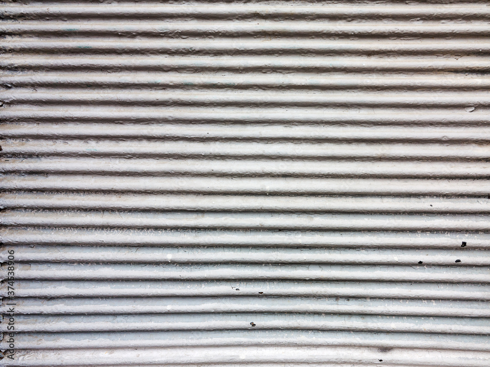 Old metal blinds painted with thick layer of light paint as background Old metal blinds painted with thick layer of light paint as background