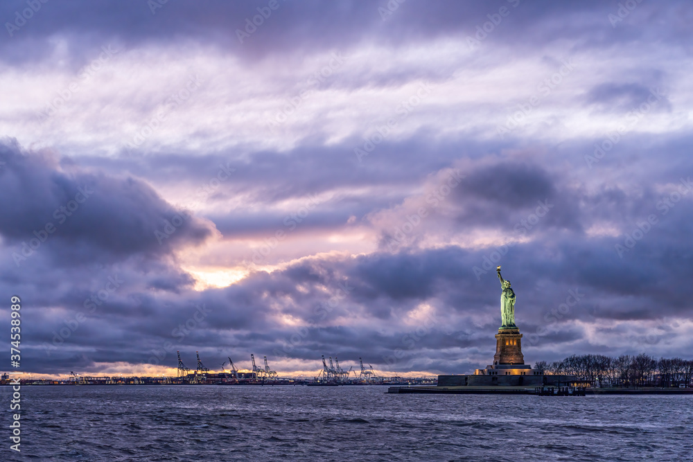 Statue of Liberty on Liberty Island at sunset, New York City, USA Statue of Liberty on Liberty Island at sunset, New York City, USA