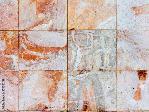Decorative facing tiles, stylized marbled as textured background © Elena
