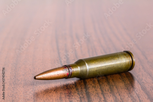 Carta da parati Closeup of cartridge case with bullet