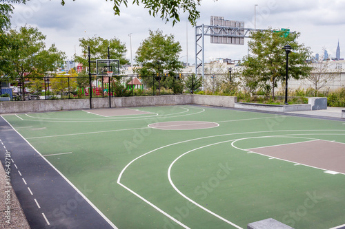 Photography Empty basketball court in a park in New York City