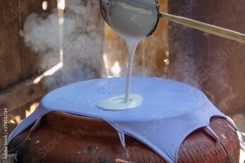 pouring rice oil into tissu