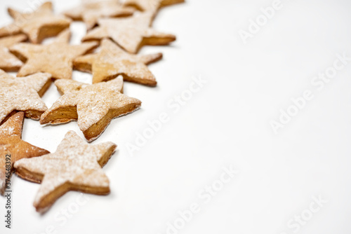 A pile of star shape sweet cookies with copy space