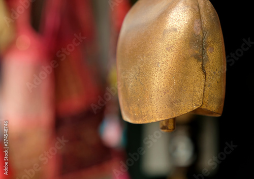 Tin yak or oxen bell - symbols and signs of indian (hindu) and buddhist religions and tradition.