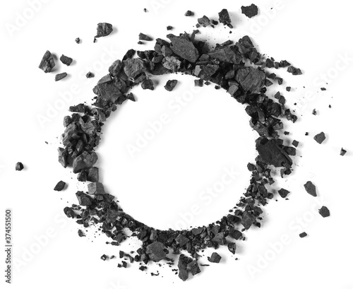 фотографія Black coal dust with fragments in shape circle isolated on white background and
