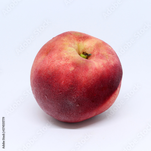 Nectarine fruit isolated on white background. A variation of peach