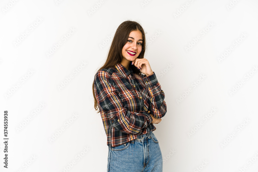 Young caucasian woman isolated on white background smiling happy and confident, touching chin with hand. Young caucasian woman isolated on white background smiling happy and confident, touching chin with hand.