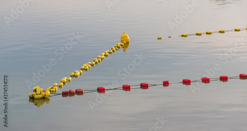 water buoys defining the swimming area. Protection water buoys on lake.