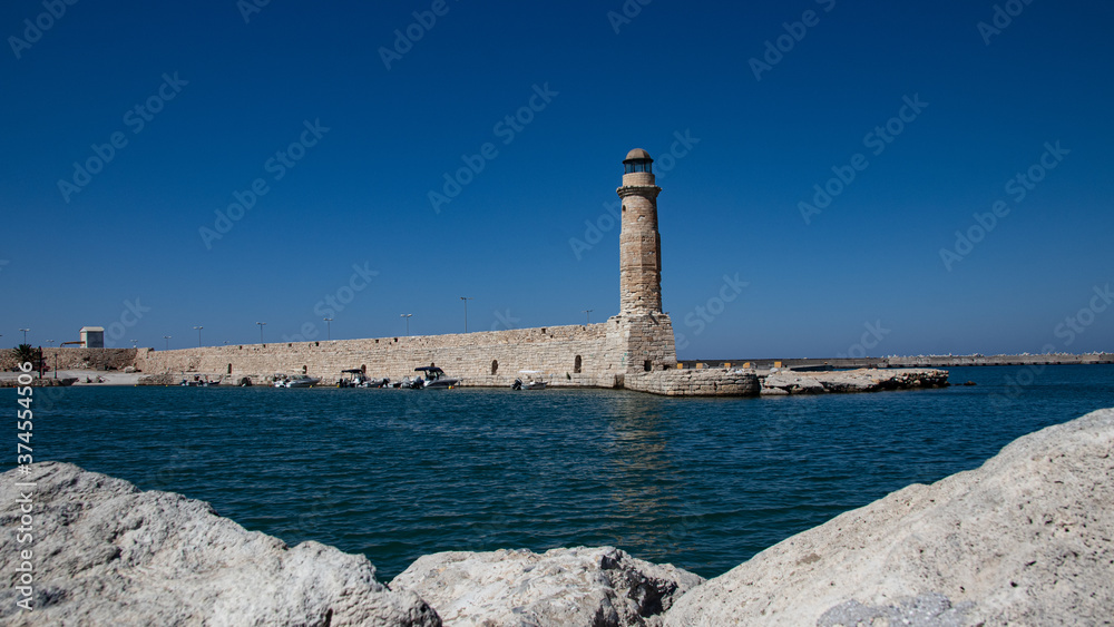 Ancient Venetian Harbour of Rethymno with Light Tower