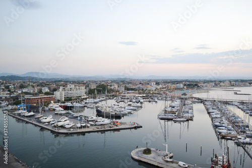 yachts on the pier, sea coast, evening panorama of the sea.  a small town by the sea.  sunset over the sea. many boats in the port © Myroslava