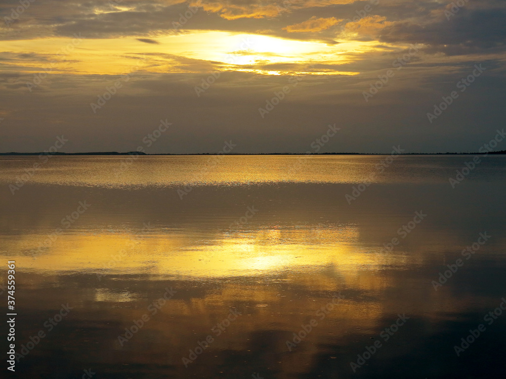 Authentic water landscape at sunset on a beautiful evening. Vityazevsky Liman, Krasnodar Territory, Russia