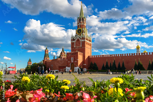 Moscow Kremlin on Red Square in summer, Russia. Beautiful scenic view of old Spasskaya Tower of Kremlin in Moscow city center.