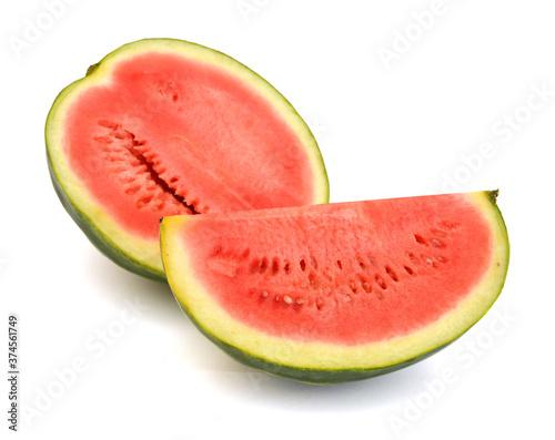 haft and slice of watermelon over white background with clipping path
