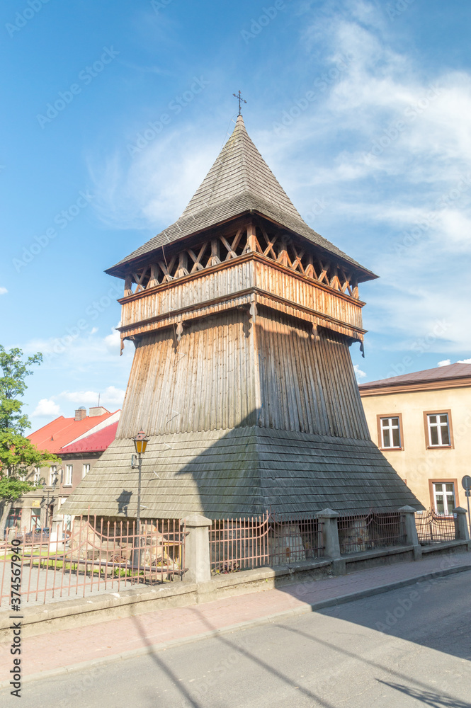 Wooden belfry of Roman Catholic Parish of St. Nicholas in Bochnia, Poland.