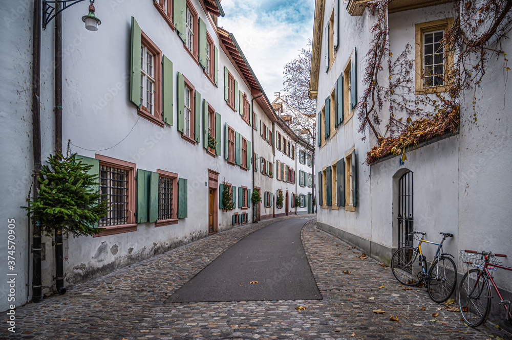 Quiet deserted street in pre-Christmas time in the old city of Basel, Switzerland