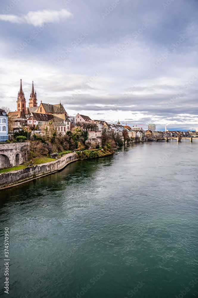 View on the Basel Cathedral and old town of Basel from the Rhein river
