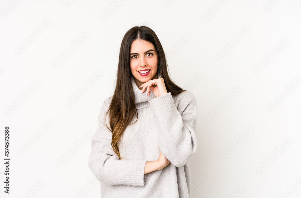 Young caucasian woman isolated on a white background smiling happy and confident, touching chin with hand. Young caucasian woman isolated on a white background smiling happy and confident, touching chin with hand.