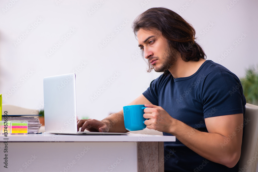 Young man employee working from house Young man employee working from house
