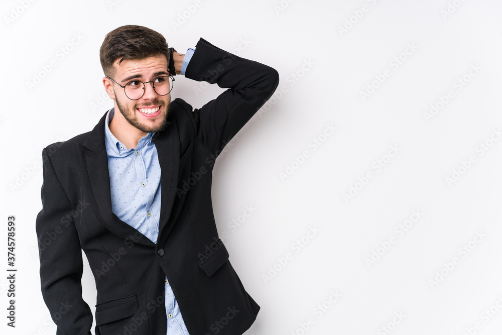 Young caucasian business man posing in a white background isolated Young caucasian business man touching back of head, thinking and making a choice. Young caucasian business man posing in a white background isolated Young caucasian business man touching back of head, thinking and making a choice.