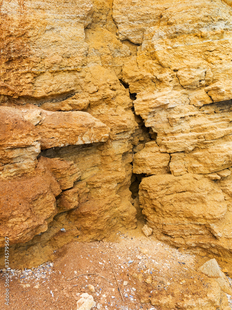 Fototapeta premium Desert landscape with multi-colored yellow, green and blue clay deposits of minerals in geological formations