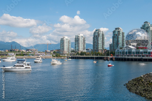 Vancouver  British Columbia  Canada Jul-25-2014  gt  False Creek surrounded by buildings and boats on a sunny summer morning