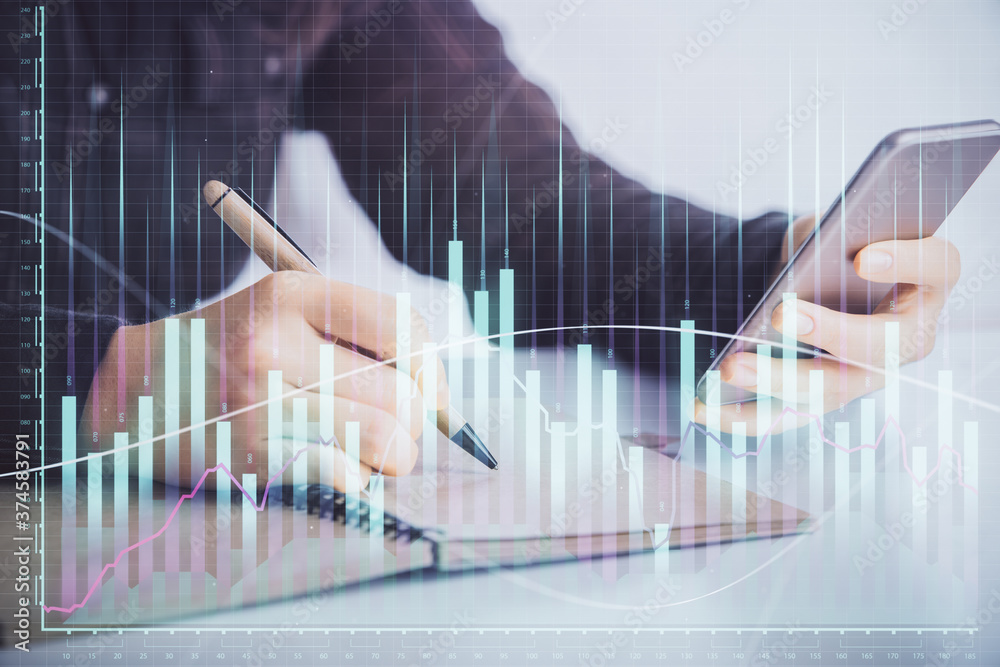 Double exposure of forex graph sketch hologram and woman holding and using a mobile device. Stock market concept. Double exposure of forex graph sketch hologram and woman holding and using a mobile device. Stock market concept.