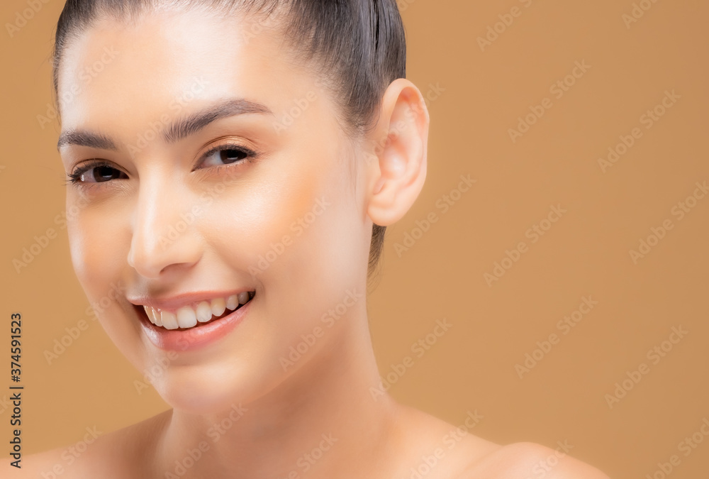 Beautiful woman with healthy skin with a brown background. Take care of your skin by spa course. Smile face Beautiful woman with healthy skin with a brown background. Take care of your skin by spa course. Smile face