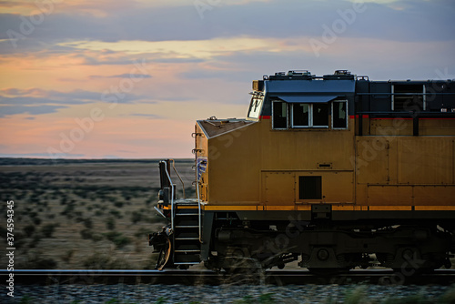 Arizona, USA - May, 2020: American train in the desert. Business and cargo transportation by rail.