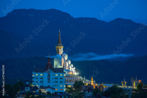 .the beautiful wat Phachonkeaw in twilight..5 sitting buddha statues on Khao Kho hill the beautiful landmark and famous in Thailand... photo