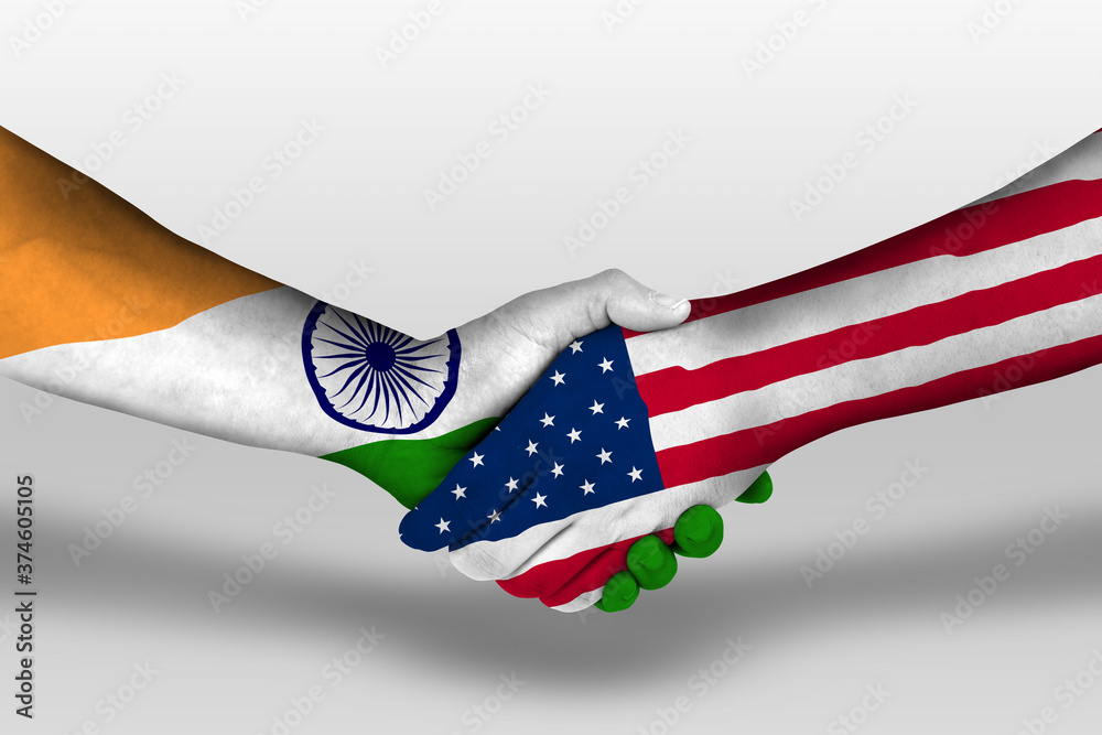 Handshake between united states of america and india flags painted on