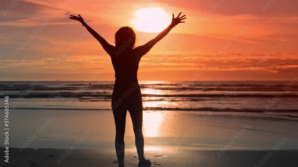 Young happy slim woman on the ocean shore, she enjoys her successes. Young happy slim woman on the ocean shore, she enjoys her successes.
