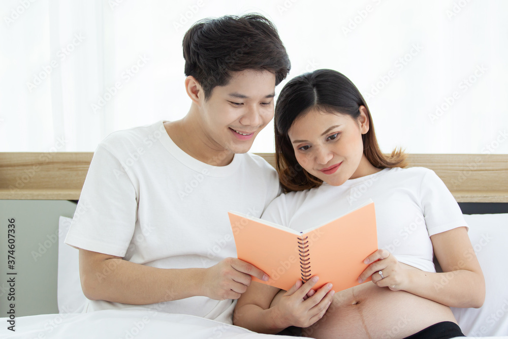 Portrait of lovely husband and wife reading a book together. Portrait of lovely husband and wife reading a book together.