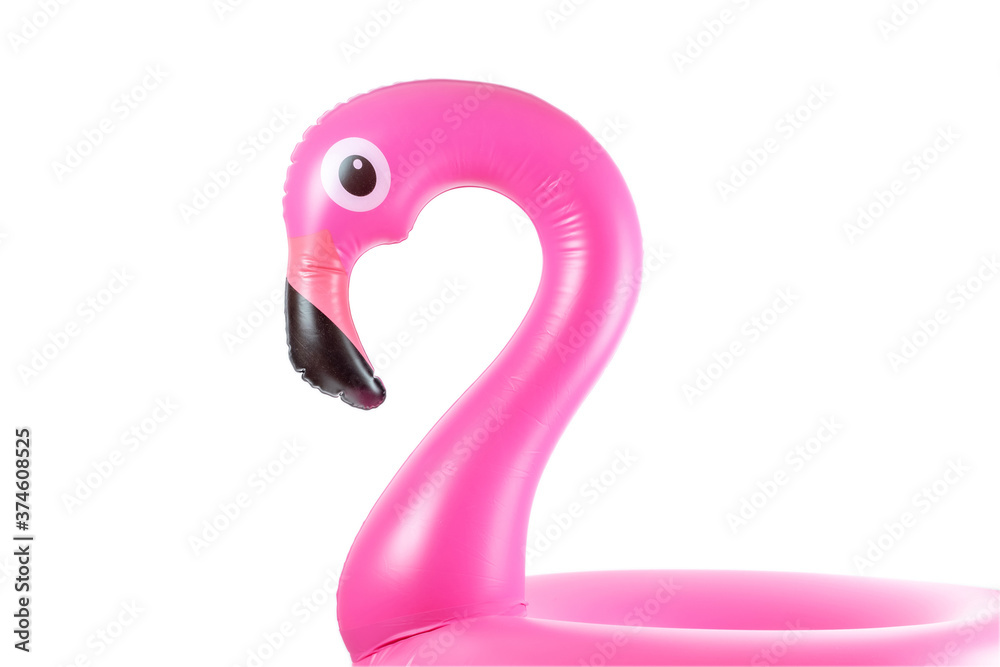 Summer fun beach. Pink pool inflatable flamingo for summer beach isolated on white background. Funny bird toy for kids. Summer fun beach. Pink pool inflatable flamingo for summer beach isolated on white background. Funny bird toy for kids.