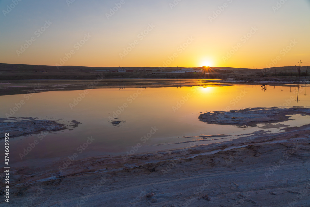 Dried up salt lake at sunrise