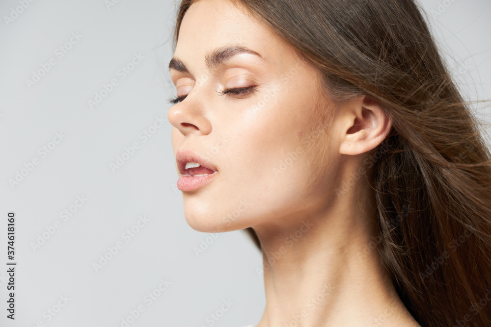 brunette with closed eyes side view long hair cropped brunette with closed eyes side view long hair cropped